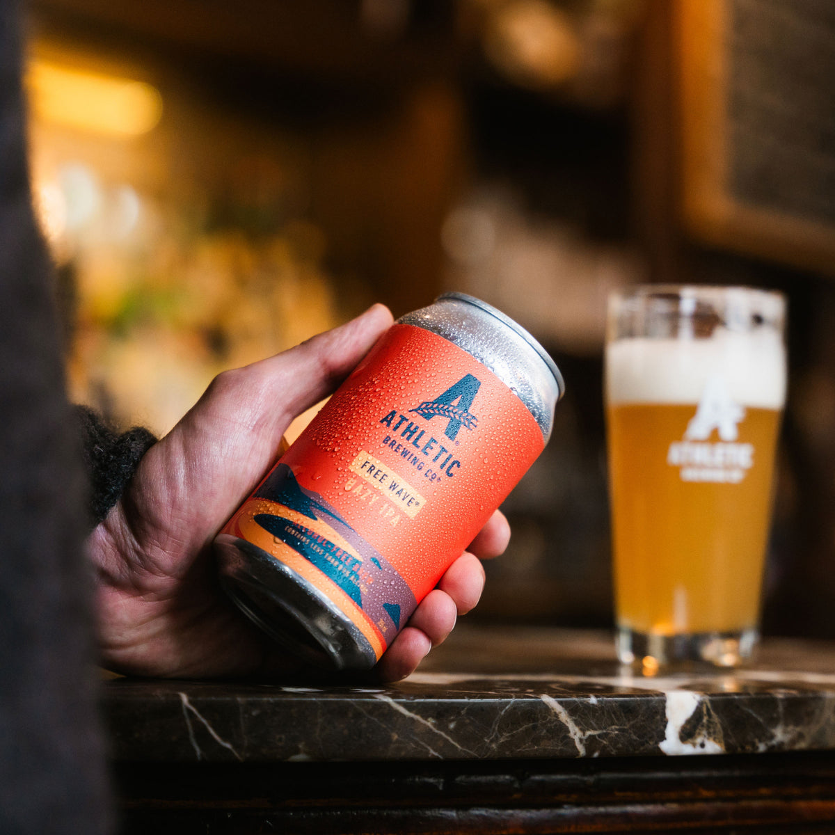 can of Free Wave and glass