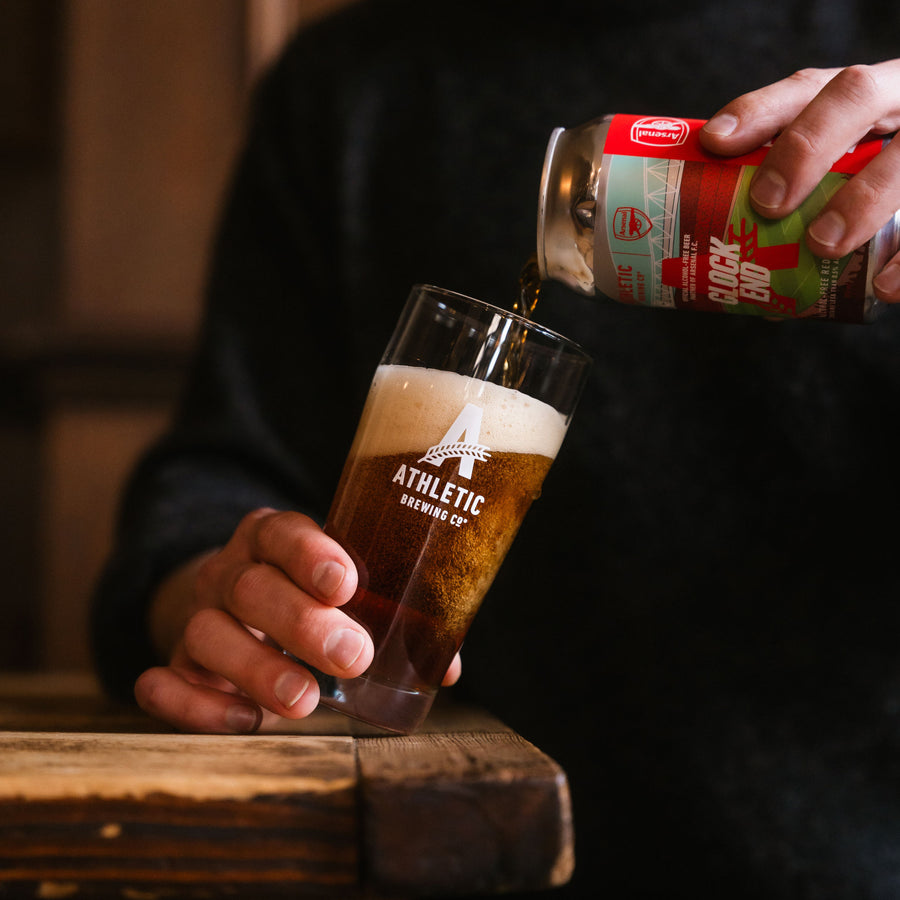 Pouring Clock End alcohol-free red ale into a glass.